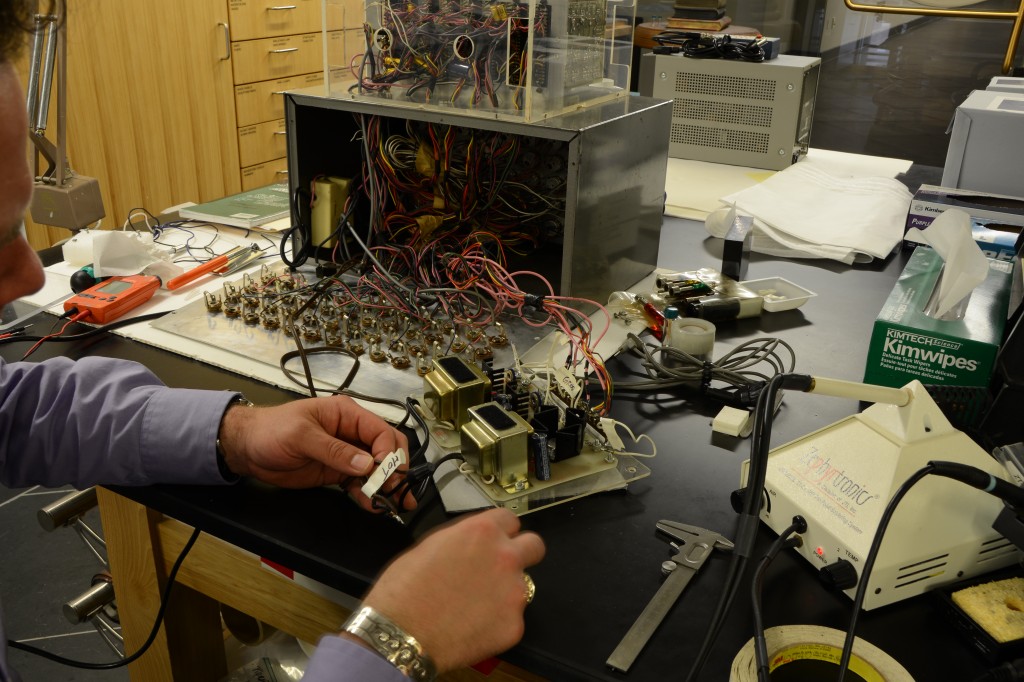 cleans the artwork’s systems, which were hand-wired by the artists.