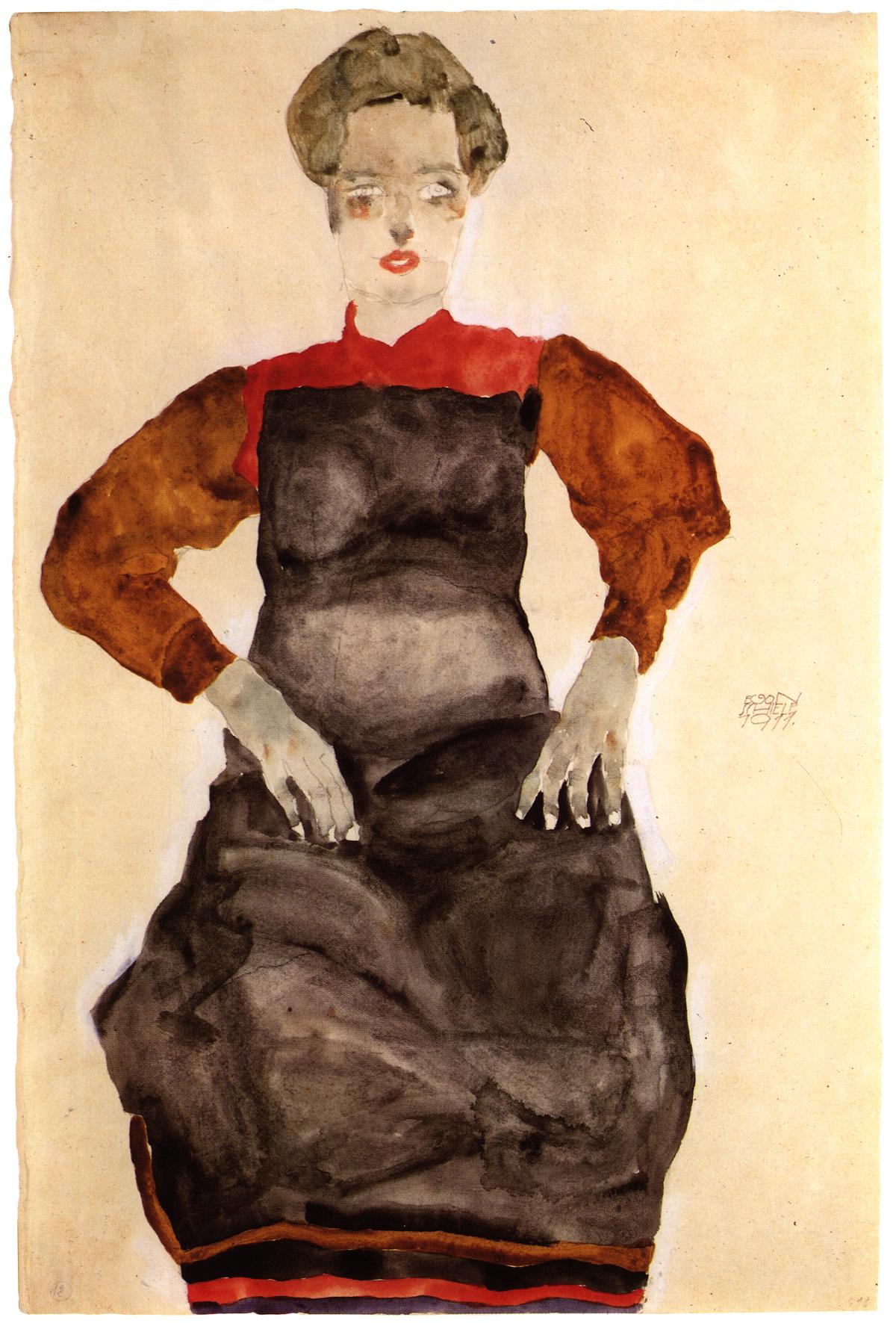 woman in black pinafore 1911.jpg