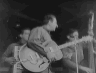 Music at USO Camp Show in Korea (1953) - Imgur.gif