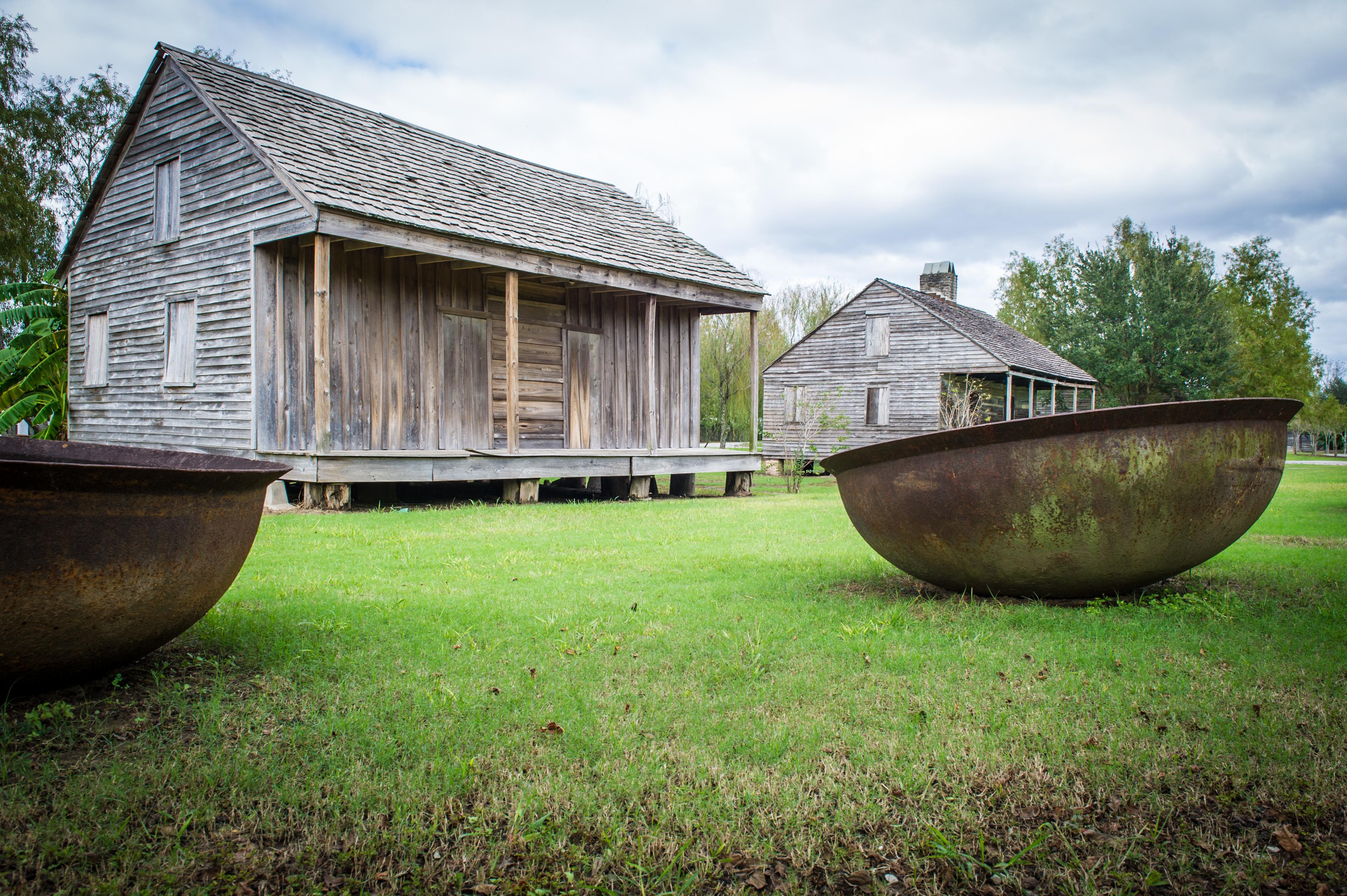 slave cabins and sugar kettles