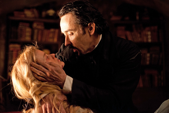 Alice Eve and John Cusack in Relativity Media’s The Raven