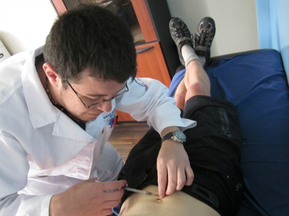 The author receives the first abdominal anti-rabies injection