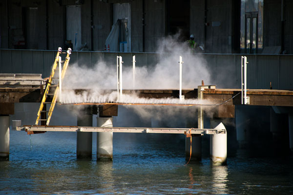 The water vapor spurts from a pipe studded with 800 petite nozzles.