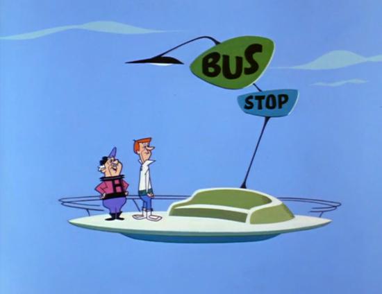 George waiting at the bus stop after his driver’s license is suspended (1963)