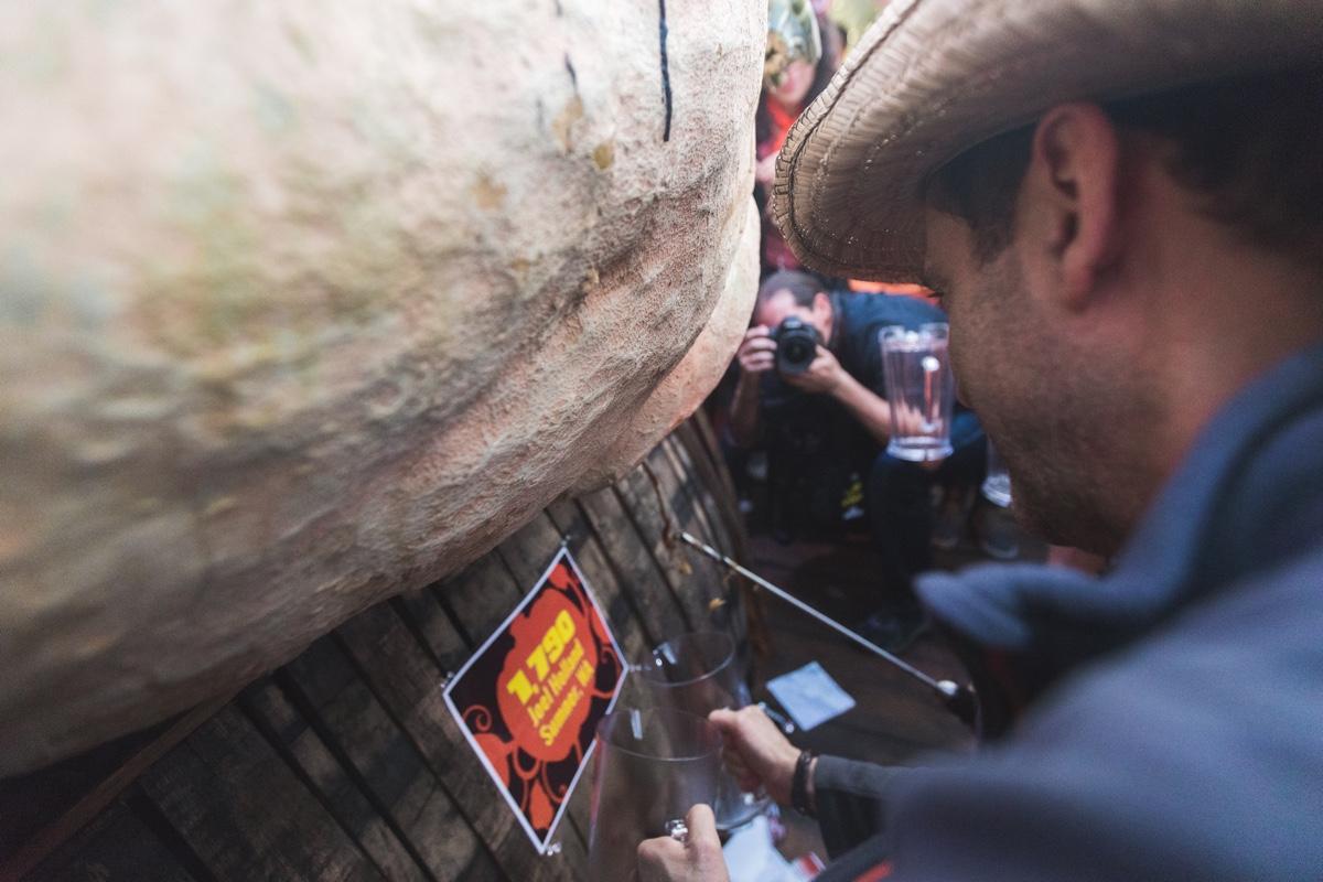 Festival goers enjoying beer from the pumpkin keg