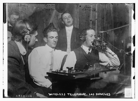 Men using radio technology circa 1910-1915, called Wireless Telephone at the time
